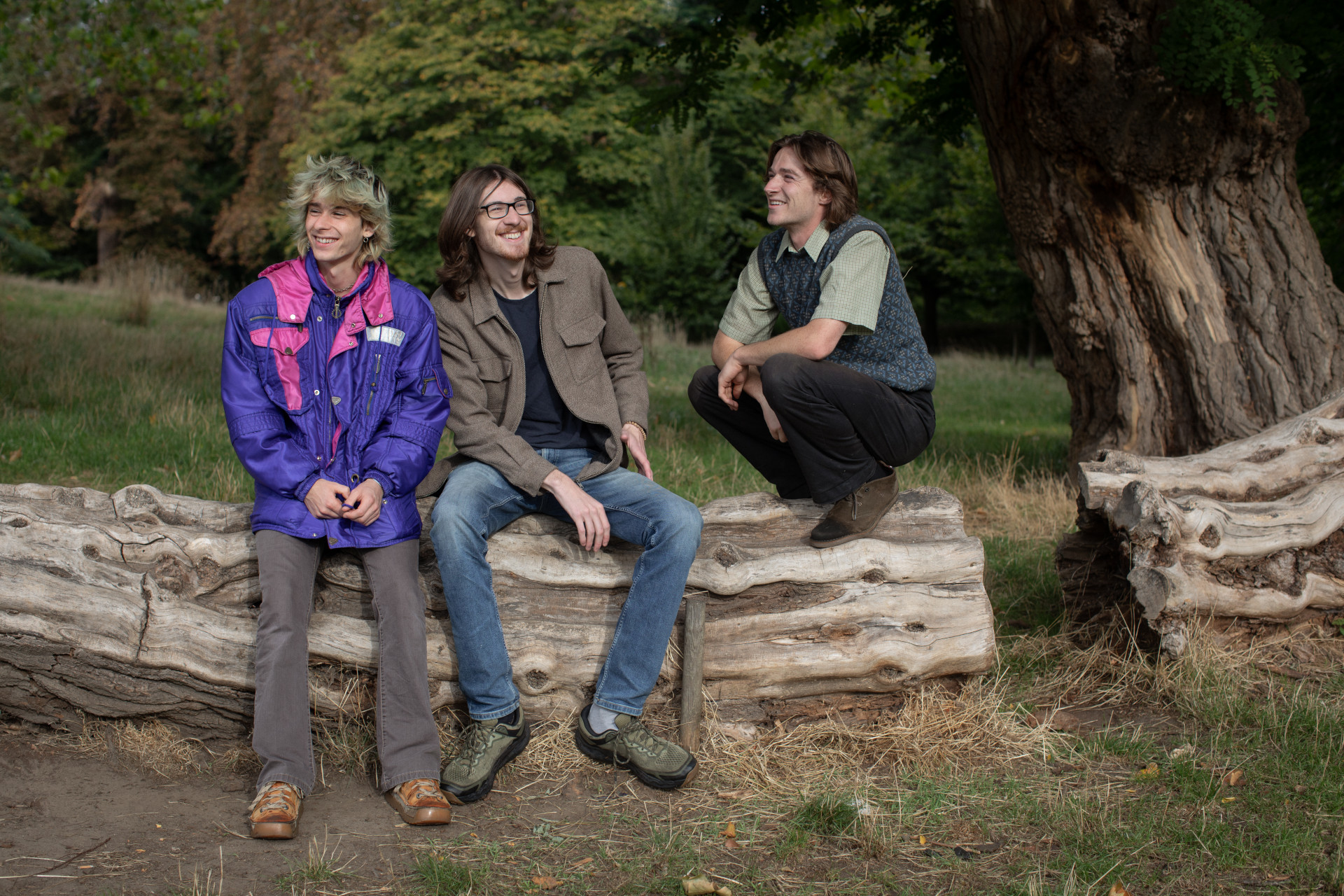 EMRYS contemplate on a log